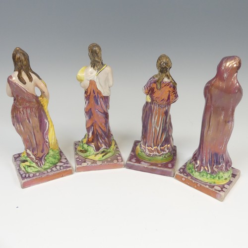 140 - A matched group of four Dixon, Austin and Co prattware Figures, early 19thC, modelled as the Four Se... 