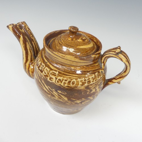 143 - A late 19thC slipware marriage Teapot, with double spout and cover, chips to rim, inscribed for 'Mr ... 