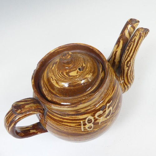 143 - A late 19thC slipware marriage Teapot, with double spout and cover, chips to rim, inscribed for 'Mr ... 