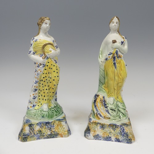 145 - A matched pair of early 19thC prattware Figures, presumably each one of the Four Seasons, with spong... 