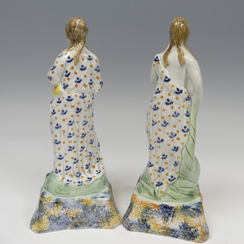 145 - A matched pair of early 19thC prattware Figures, presumably each one of the Four Seasons, with spong... 