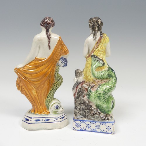 146 - A 19thC pratt ware figure of a Woman, modelled with a sea Creature, raised on plinth base, H 16cm, t... 