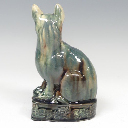 149 - A late 18thC Whieldon- style creamware model of a Cat, in seated position upon plinth with moulded o... 