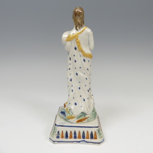 153 - A 19thC prattware figure of Summer, modelled with cornucopia cluthed in arm, raised on plinth base w... 