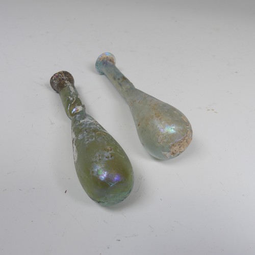 173 - A Roman iridescent glass Vessel, of waisted tapering form and flared rim, H 12.5cm, together with an... 