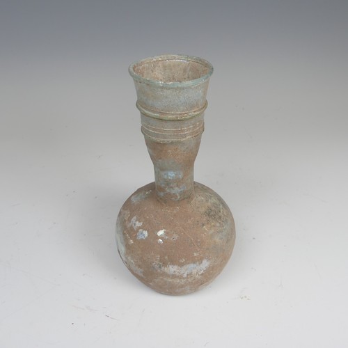 177 - A Roman iridescent glass Flask, c. 2-3 century AD, of bulbous body with tapering ribbon trailed neck... 