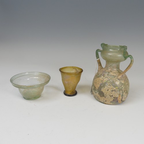 178 - A Roman green glass twin-handled Flask, of bulbous form, H 14.5cm, together with a Roman glass Bowl ... 