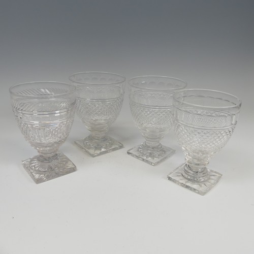 184 - A pair of fine quality antique Glasses, with diamond cut band on stepped foot and square plinth base... 