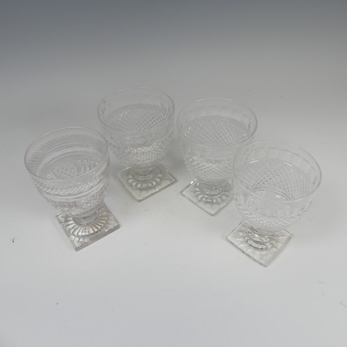 184 - A pair of fine quality antique Glasses, with diamond cut band on stepped foot and square plinth base... 