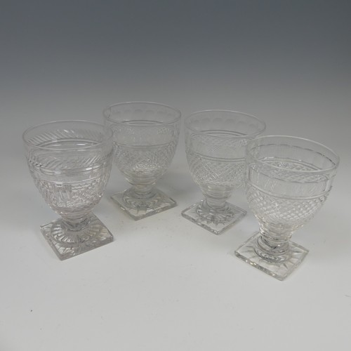 184 - A pair of fine quality antique Glasses, with diamond cut band on stepped foot and square plinth base... 