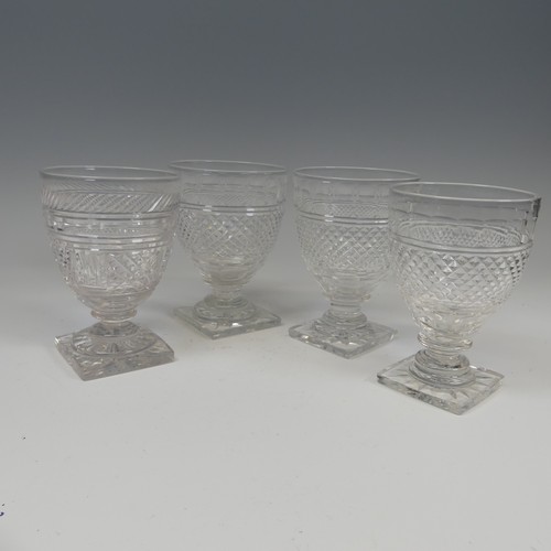 184 - A pair of fine quality antique Glasses, with diamond cut band on stepped foot and square plinth base... 