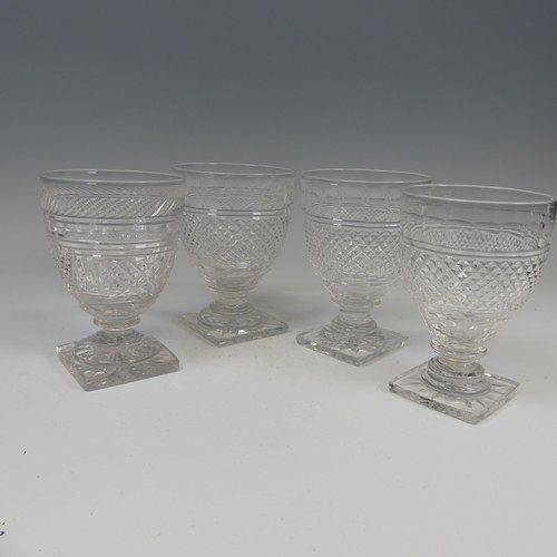 184 - A pair of fine quality antique Glasses, with diamond cut band on stepped foot and square plinth base... 