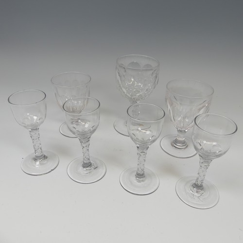 186 - A set of four antique Wine Glasses, with round funnel bowl on faceted stem, H 14.5cm, together with ... 