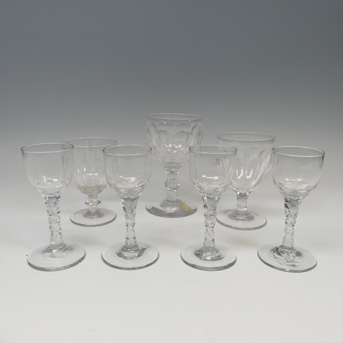 186 - A set of four antique Wine Glasses, with round funnel bowl on faceted stem, H 14.5cm, together with ... 