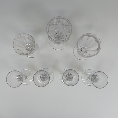 186 - A set of four antique Wine Glasses, with round funnel bowl on faceted stem, H 14.5cm, together with ... 