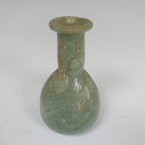 190 - A Roman marbled glass toilet bottle c. 1st century AD, green with white striations and of pear shape... 