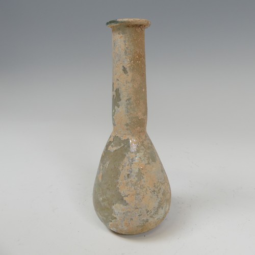 192 - A Roman iridescent glass Unguentarium, of bulbous base with tapering neck, H 14.5cm.... 