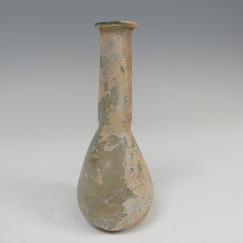 192 - A Roman iridescent glass Unguentarium, of bulbous base with tapering neck, H 14.5cm.... 