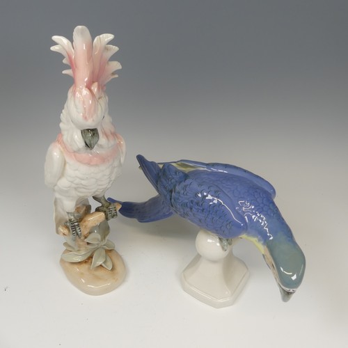 196 - A large Royal Dux porcelain figure of a Parrot, with blue feathers, raised on ball finial, pink tria... 