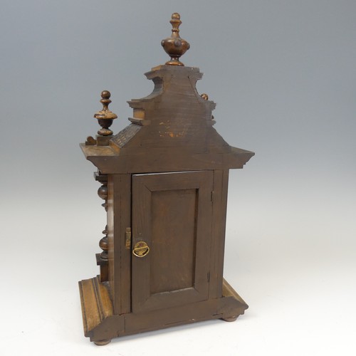 310 - A late 19th century continental walnut Mantel Clock, movement marked with crossed arrows and label '... 