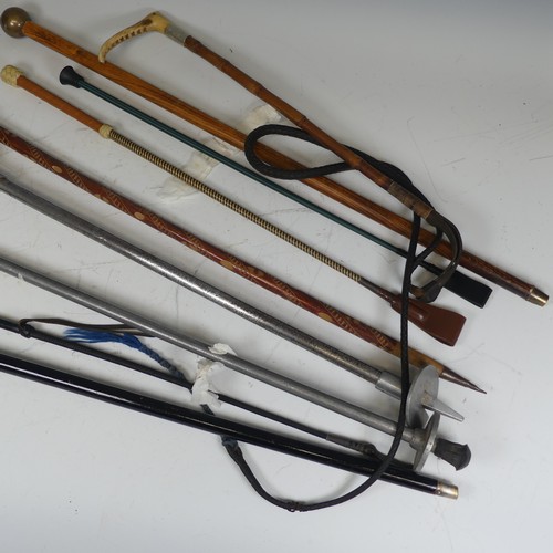 331 - A Swaine & Adeney riding Crop, together with a small quantity of walking sticks, shooting sticks... 