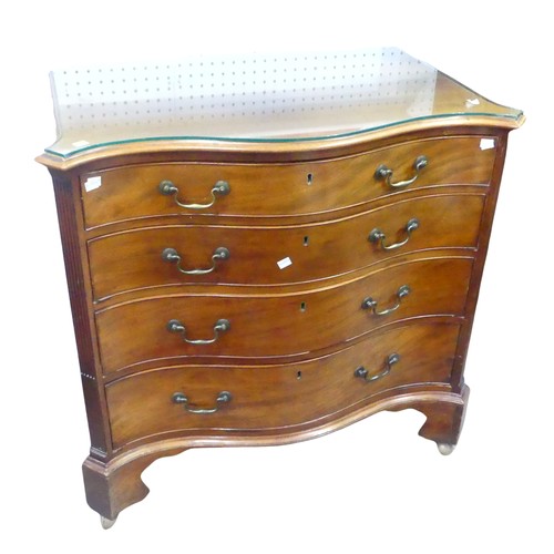 380 - A George III style mahogany serpentine front Chest of drawers, raised on shaped bracket feet and cas... 