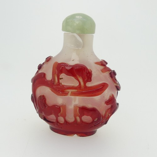 193 - A Chinese overlayed glass Snuff Bottle, with yellow ground, overlayed in red and white depicting bir... 