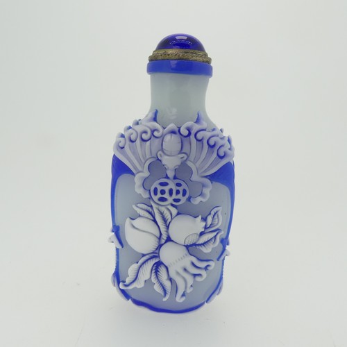 193 - A Chinese overlayed glass Snuff Bottle, with yellow ground, overlayed in red and white depicting bir... 