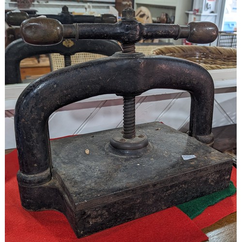 337 - An antique iron Book Press, W 40 cm x H 30 cm x D 25 cm.