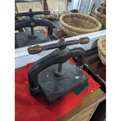 337 - An antique iron Book Press, W 40 cm x H 30 cm x D 25 cm.