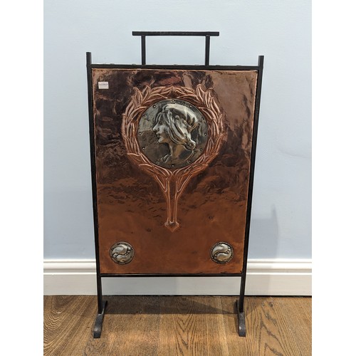 330 - A rare Arts and Crafts copper and pewter Fire Screen, wrought iron surround enclosing embossed coppe... 