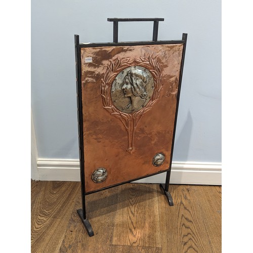 330 - A rare Arts and Crafts copper and pewter Fire Screen, wrought iron surround enclosing embossed coppe... 