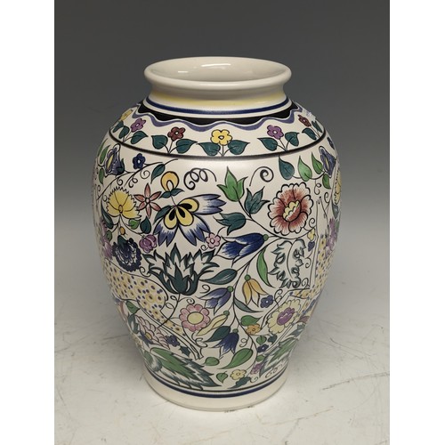 96 - A large 20thC Poole Pottery Vase, decorated by N Blackmore in a Persian style, with entangled foliag... 