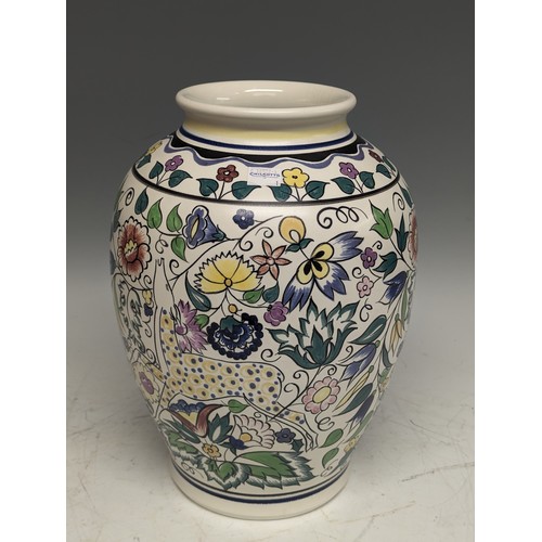 96 - A large 20thC Poole Pottery Vase, decorated by N Blackmore in a Persian style, with entangled foliag... 