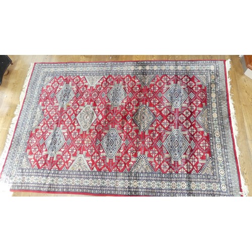 641 - Tribal Rugs; a finely knotted red ground Persian rug, wool pile on cotton base, 280cm x 176cm, pile ... 