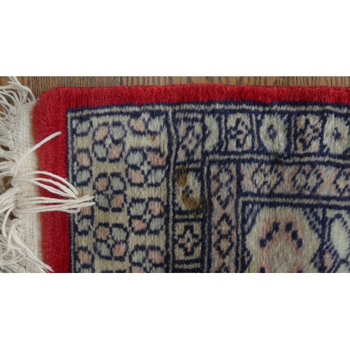 641 - Tribal Rugs; a finely knotted red ground Persian rug, wool pile on cotton base, 280cm x 176cm, pile ... 