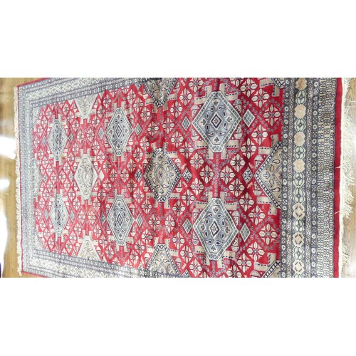 641 - Tribal Rugs; a finely knotted red ground Persian rug, wool pile on cotton base, 280cm x 176cm, pile ... 