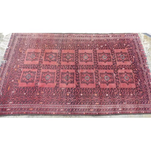 643 - Tribal Rugs; a light-red ground Afghan rug, wool pile on wool base, 219cm x 126cm, good overall cond... 