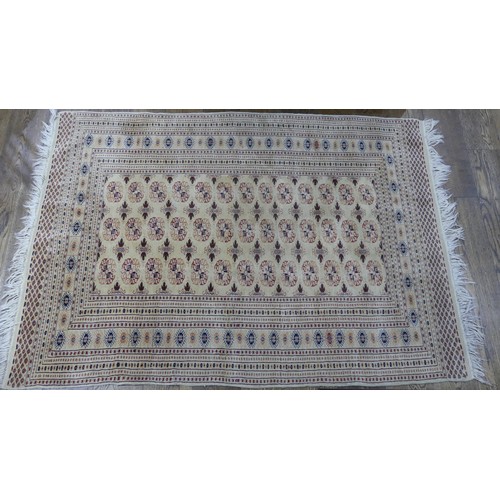 644 - Tribal rugs; an old hand-knotted Bokhara rug, fine wool pile on a cotton base, 196cm x 130cm, good c... 