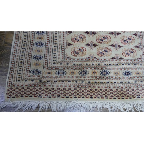 644 - Tribal rugs; an old hand-knotted Bokhara rug, fine wool pile on a cotton base, 196cm x 130cm, good c... 