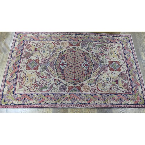 647 - A decorative Arts & Crafts style 'Manx Revival', machine-made rug, 200cm x 122cm.... 