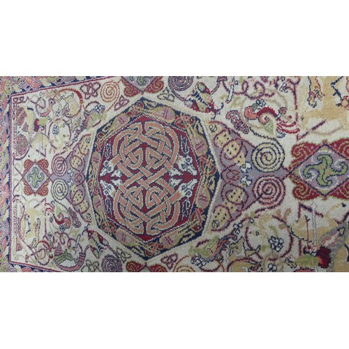 647 - A decorative Arts & Crafts style 'Manx Revival', machine-made rug, 200cm x 122cm.... 