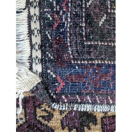 649 - Tribal Rugs; an old Baluchi Prayer Rug, 100% wool, 128cm x 74cm, pile slightly worn.... 