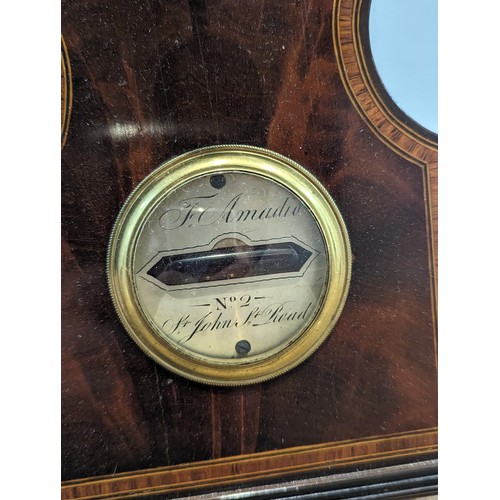 305 - A 19thC mahogany and inlaid Barometer, with circular silvered dial, L 113 cm.