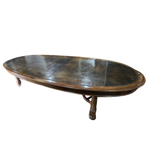 619 - An unusual Victorian oval Library Table / boardroom Table, with gilt tooled leather skived top, rais... 