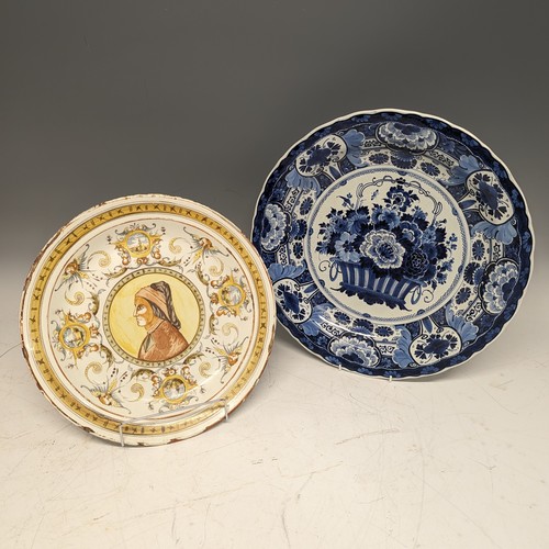 79 - A 19thC Continental majolica Charger, of white ground with central painted portrait of figure enclos... 