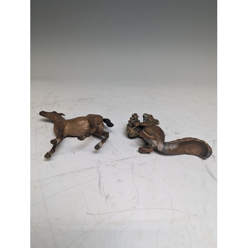 282A - A late 19th / early 20th century Austrian cold painted bronze of a Squirrel holding a pinecone, attr... 