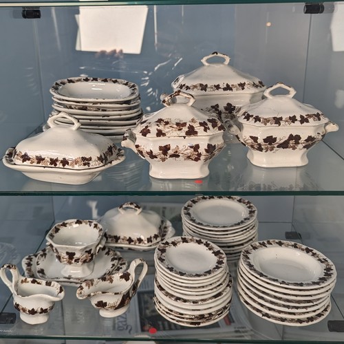 136 - A miniature Victorian Staffordshire pottery Dinner Service, comprising Gravy Boat, Dinner Plates, Tu... 