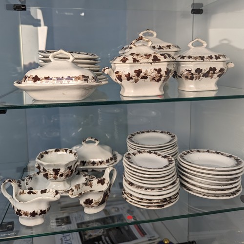 136 - A miniature Victorian Staffordshire pottery Dinner Service, comprising Gravy Boat, Dinner Plates, Tu... 