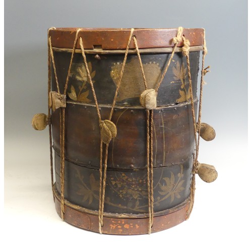 Battle of Waterloo interest: a George III painted birch Military Drum, believed originally from the Battle of Waterloo, with painted crown and scroll decoration, cords and skin, the centre with replacement repaired band, 47.5cm high x 42cm diameter. Note: According to tradition, the drum was found on the battlefield after the Battle of Waterloo in 1815.  It was donated to the Worcester Regimental museum in Norton Barracks.  When the museum moved to smaller venue the drum was returned to the family who originally donated it, and then sold on many years later. (See Martin Rowe, The Truro Auction Centre, Lot 919, 28.02.2020). Provenance: The Eyres Collection of French Napoleonic Prisoner-of-War Works of Art and Antique Weapons, assembled over many years by a Devon collector.  Sold on the instructions of the Executor.
